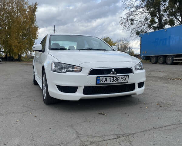Мицубиси Лансер 2015 в Остоге на Automoto.ua Белый Мицубиси Лансер, объемом двигателя 2 л и пробегом 131 тыс. км за 9000 $, фото 16 на Automoto.ua