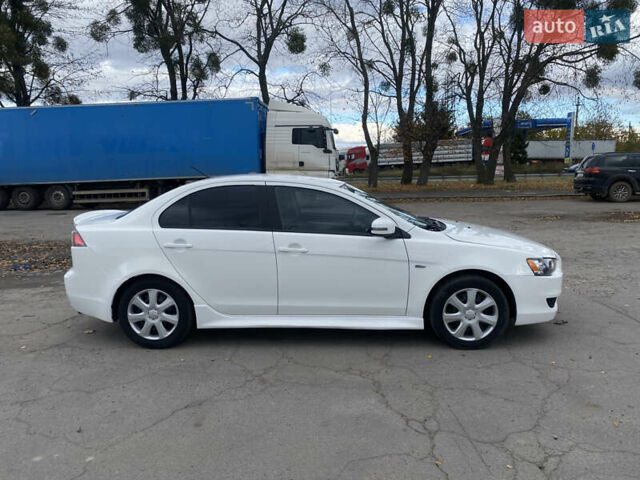 Мицубиси Лансер 2015 в Остоге на Automoto.ua Белый Мицубиси Лансер, объемом двигателя 2 л и пробегом 131 тыс. км за 9000 $, фото 15 на Automoto.ua