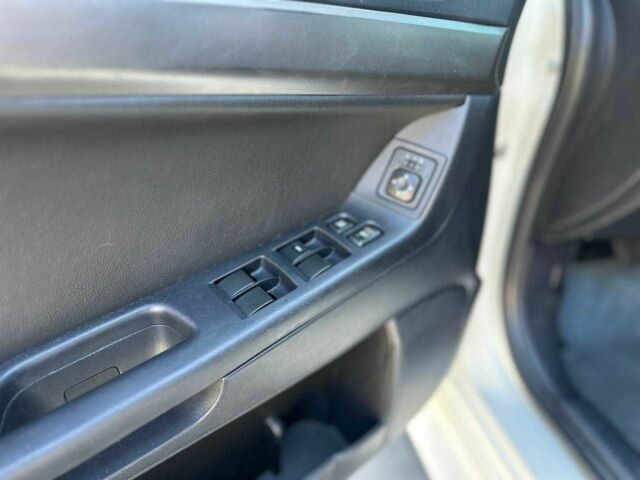 Белый Мицубиси Лансер, объемом двигателя 2 л и пробегом 113 тыс. км за 8500 $, фото 9 на Automoto.ua