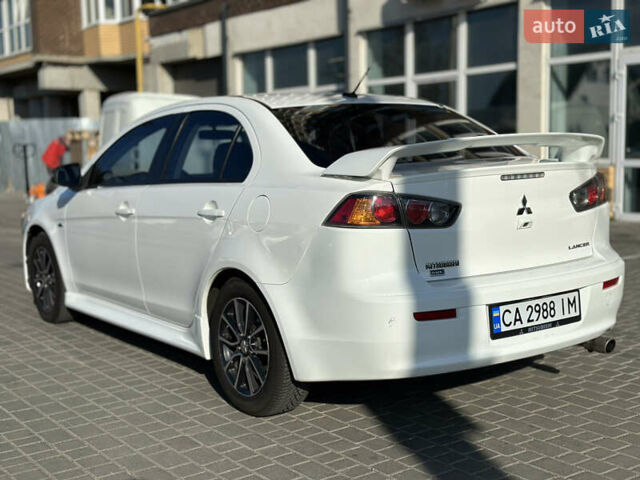 Білий Міцубісі Lancer, об'ємом двигуна 2.36 л та пробігом 175 тис. км за 9000 $, фото 3 на Automoto.ua