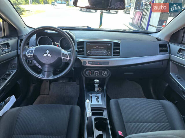 Міцубісі Lancer 2015 у Дніпро (Дніпропетровську) на Automoto.ua Білий Міцубісі Lancer, об'ємом двигуна 2 л та пробігом 165 тис. км за 8500 $, фото 7 на Automoto.ua