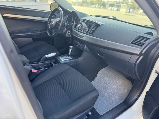 Білий Міцубісі Lancer, об'ємом двигуна 2 л та пробігом 165 тис. км за 8999 $, фото 14 на Automoto.ua
