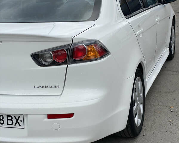 Мицубиси Лансер 2015 в Остоге на Automoto.ua Белый Мицубиси Лансер, объемом двигателя 2 л и пробегом 131 тыс. км за 9000 $, фото 14 на Automoto.ua