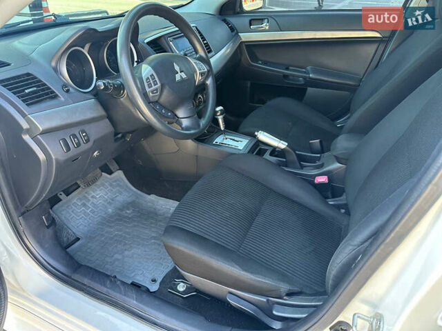 Білий Міцубісі Lancer, об'ємом двигуна 2 л та пробігом 165 тис. км за 7899 $, фото 8 на Automoto.ua