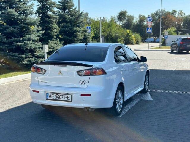 Белый Мицубиси Лансер, объемом двигателя 2 л и пробегом 113 тыс. км за 8500 $, фото 3 на Automoto.ua