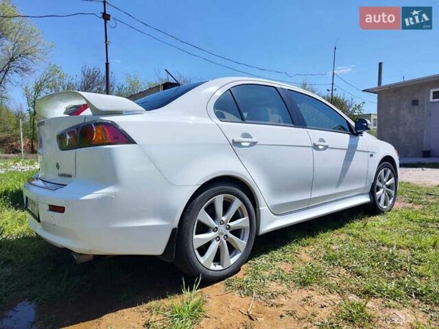 Белый Мицубиси Лансер, объемом двигателя 2.4 л и пробегом 52 тыс. км за 12100 $, фото 2 на Automoto.ua