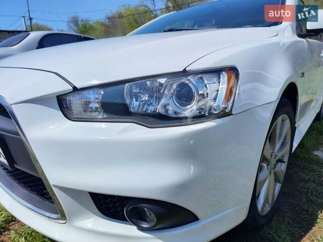 Белый Мицубиси Лансер, объемом двигателя 2.4 л и пробегом 52 тыс. км за 12100 $, фото 1 на Automoto.ua