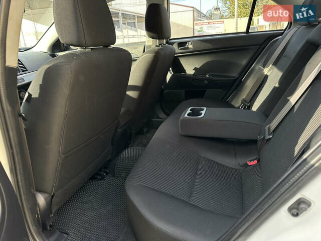 Білий Міцубісі Lancer, об'ємом двигуна 2.36 л та пробігом 175 тис. км за 9000 $, фото 7 на Automoto.ua