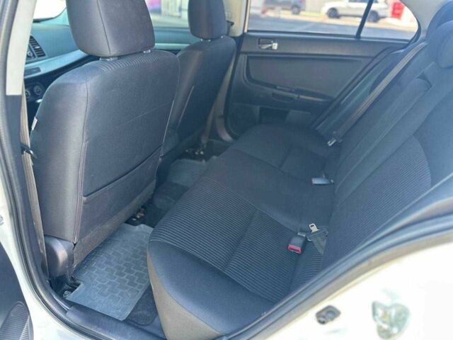 Белый Мицубиси Лансер, объемом двигателя 2 л и пробегом 113 тыс. км за 8500 $, фото 5 на Automoto.ua