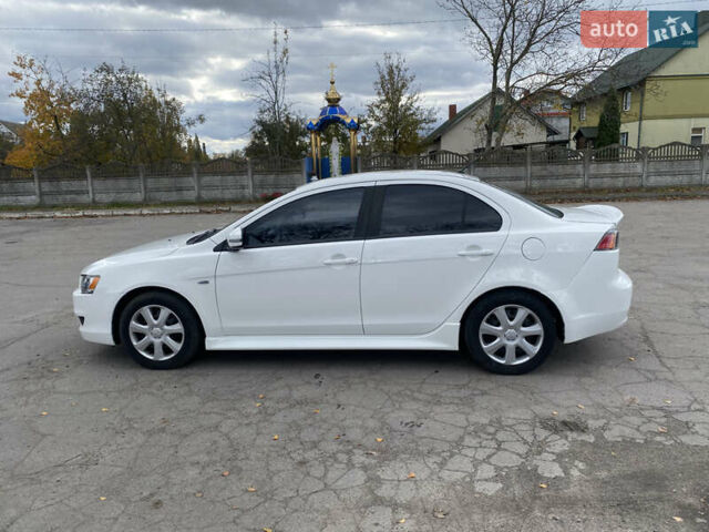 Мицубиси Лансер 2015 в Остоге на Automoto.ua Белый Мицубиси Лансер, объемом двигателя 2 л и пробегом 131 тыс. км за 9000 $, фото 12 на Automoto.ua