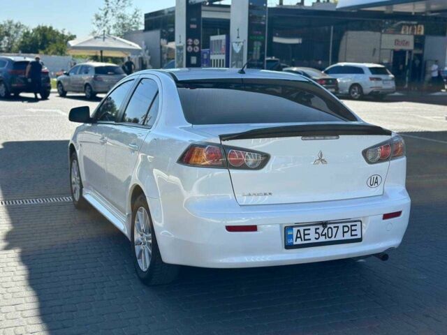 Белый Мицубиси Лансер, объемом двигателя 2 л и пробегом 113 тыс. км за 8500 $, фото 4 на Automoto.ua