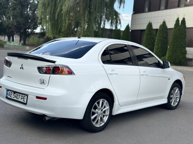 Білий Міцубісі Lancer, об'ємом двигуна 2 л та пробігом 115 тис. км за 8500 $, фото 16 на Automoto.ua