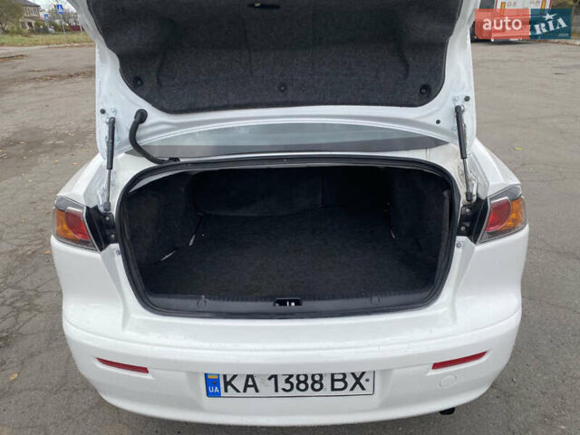 Мицубиси Лансер 2015 в Остоге на Automoto.ua Белый Мицубиси Лансер, объемом двигателя 2 л и пробегом 131 тыс. км за 9000 $, фото 8 на Automoto.ua