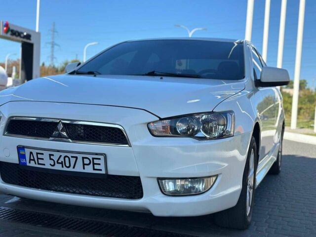 Белый Мицубиси Лансер, объемом двигателя 2 л и пробегом 113 тыс. км за 8500 $, фото 1 на Automoto.ua