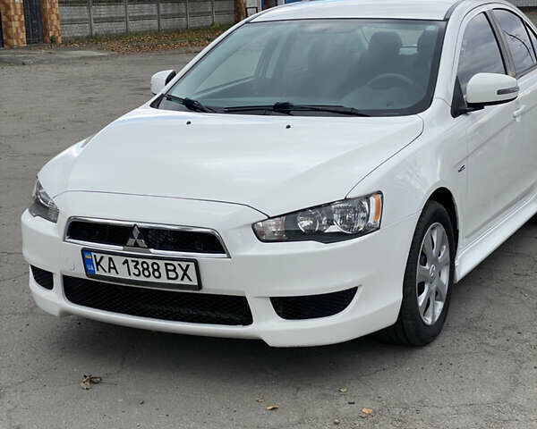Мицубиси Лансер 2015 в Остоге на Automoto.ua Белый Мицубиси Лансер, объемом двигателя 2 л и пробегом 131 тыс. км за 9000 $, фото 17 на Automoto.ua