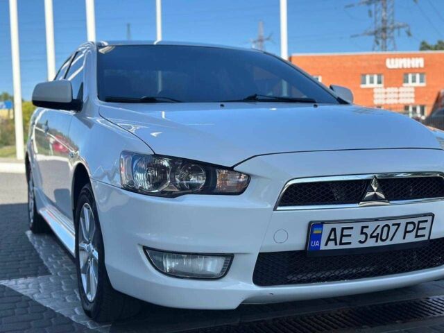 Белый Мицубиси Лансер, объемом двигателя 2 л и пробегом 113 тыс. км за 8500 $, фото 2 на Automoto.ua