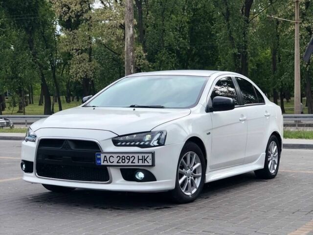 Білий Міцубісі Lancer, об'ємом двигуна 2 л та пробігом 148 тис. км за 8999 $, фото 5 на Automoto.ua