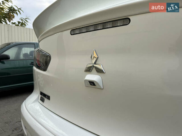 Білий Міцубісі Lancer, об'ємом двигуна 2.36 л та пробігом 175 тис. км за 9000 $, фото 8 на Automoto.ua