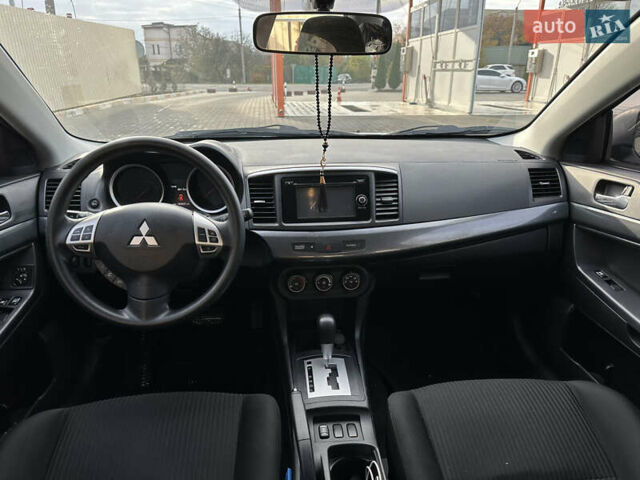 Білий Міцубісі Lancer, об'ємом двигуна 2.36 л та пробігом 175 тис. км за 9000 $, фото 6 на Automoto.ua
