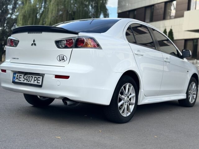 Білий Міцубісі Lancer, об'ємом двигуна 2 л та пробігом 115 тис. км за 8500 $, фото 13 на Automoto.ua
