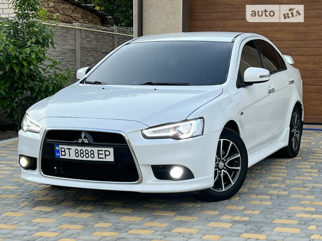 Білий Міцубісі Lancer, об'ємом двигуна 2 л та пробігом 160 тис. км за 10500 $, фото 11 на Automoto.ua