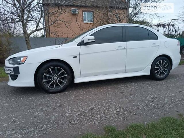 Білий Міцубісі Lancer, об'ємом двигуна 2 л та пробігом 120 тис. км за 11000 $, фото 3 на Automoto.ua