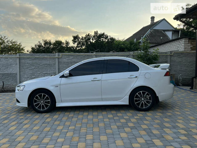 Білий Міцубісі Lancer, об'ємом двигуна 2 л та пробігом 160 тис. км за 10500 $, фото 4 на Automoto.ua