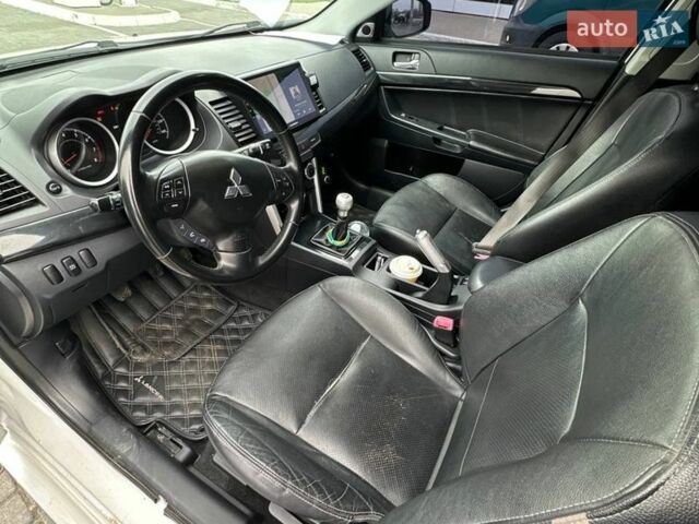 Білий Міцубісі Lancer, об'ємом двигуна 2.36 л та пробігом 230 тис. км за 9000 $, фото 7 на Automoto.ua