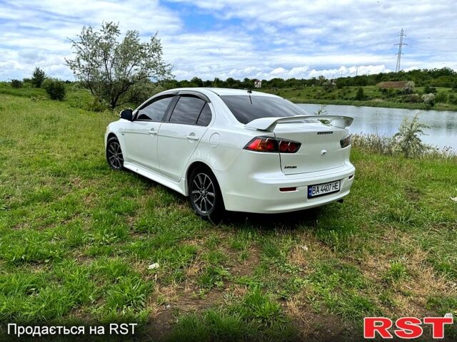 Белый Мицубиси Лансер, объемом двигателя 2 л и пробегом 100 тыс. км за 8750 $, фото 5 на Automoto.ua