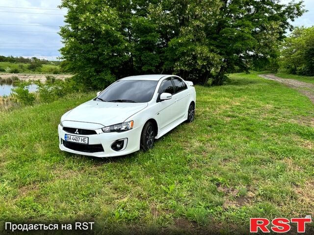 Белый Мицубиси Лансер, объемом двигателя 2 л и пробегом 100 тыс. км за 8750 $, фото 2 на Automoto.ua