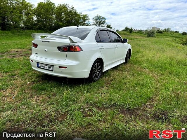 Белый Мицубиси Лансер, объемом двигателя 2 л и пробегом 100 тыс. км за 8750 $, фото 4 на Automoto.ua