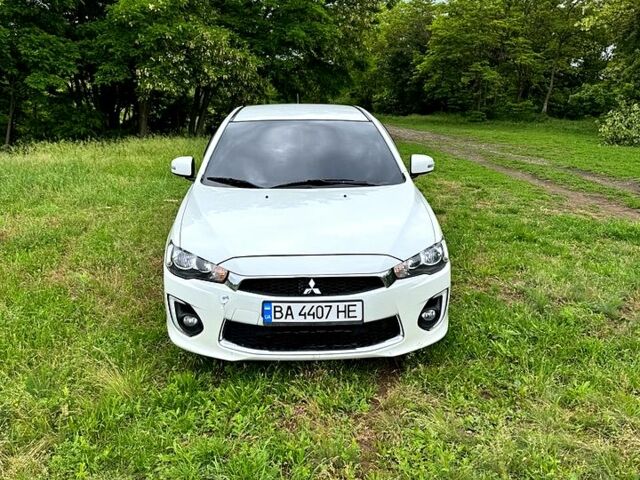 Белый Мицубиси Лансер, объемом двигателя 2 л и пробегом 100 тыс. км за 8750 $, фото 6 на Automoto.ua