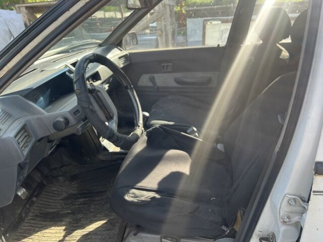 Белый Мицубиси Лансер, объемом двигателя 1.9 л и пробегом 438 тыс. км за 463 $, фото 9 на Automoto.ua