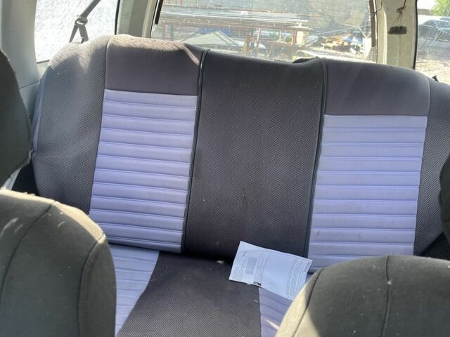 Белый Мицубиси Лансер, объемом двигателя 1.9 л и пробегом 438 тыс. км за 463 $, фото 7 на Automoto.ua