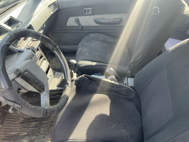 Білий Міцубісі Lancer, об'ємом двигуна 1.9 л та пробігом 438 тис. км за 463 $, фото 6 на Automoto.ua