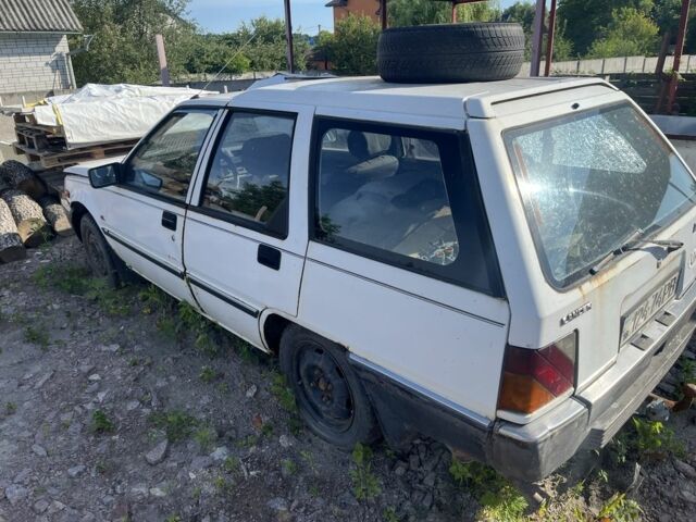 Білий Міцубісі Lancer, об'ємом двигуна 1.9 л та пробігом 438 тис. км за 463 $, фото 4 на Automoto.ua