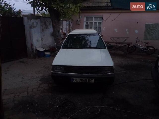 Белый Мицубиси Лансер, объемом двигателя 1.47 л и пробегом 300 тыс. км за 1100 $, фото 1 на Automoto.ua