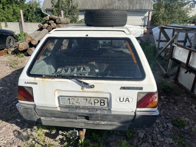 Білий Міцубісі Lancer, об'ємом двигуна 1.9 л та пробігом 438 тис. км за 463 $, фото 3 на Automoto.ua