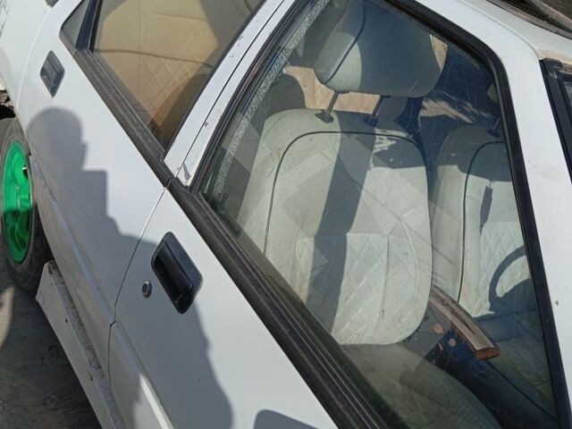 Білий Міцубісі Lancer, об'ємом двигуна 1.5 л та пробігом 280 тис. км за 601 $, фото 6 на Automoto.ua