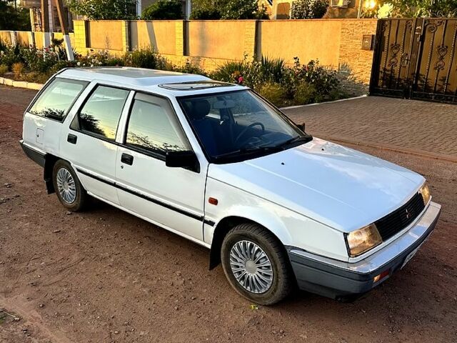 Белый Мицубиси Лансер, объемом двигателя 1.5 л и пробегом 55 тыс. км за 1500 $, фото 3 на Automoto.ua