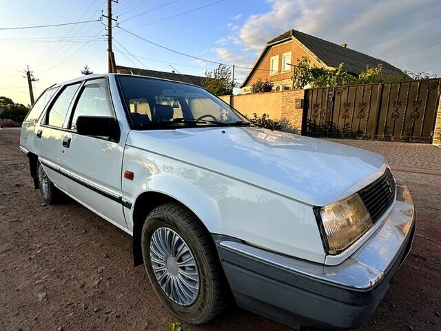 Белый Мицубиси Лансер, объемом двигателя 1.5 л и пробегом 55 тыс. км за 1500 $, фото 9 на Automoto.ua