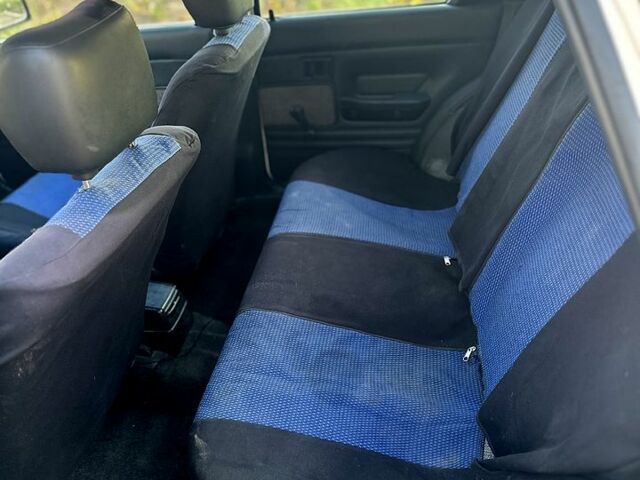 Белый Мицубиси Лансер, объемом двигателя 1.5 л и пробегом 55 тыс. км за 1500 $, фото 11 на Automoto.ua