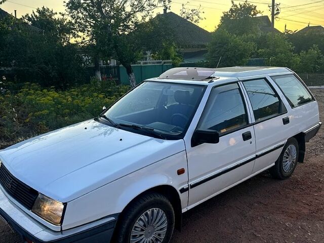 Белый Мицубиси Лансер, объемом двигателя 1.5 л и пробегом 55 тыс. км за 1500 $, фото 1 на Automoto.ua