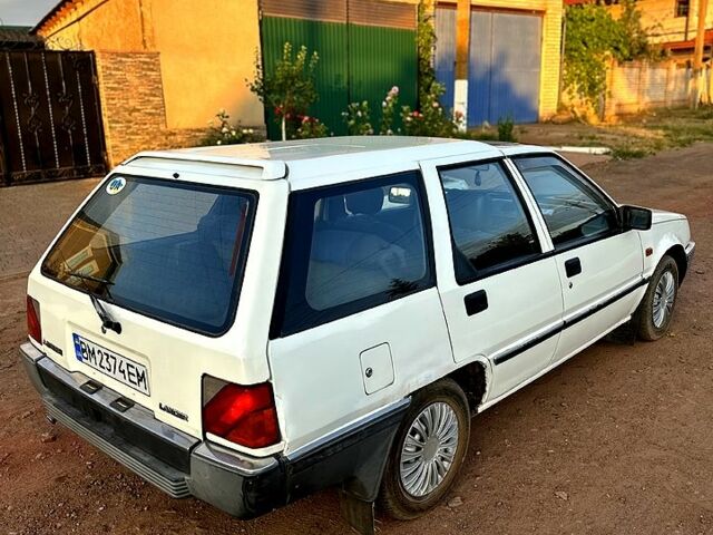 Белый Мицубиси Лансер, объемом двигателя 1.5 л и пробегом 55 тыс. км за 1500 $, фото 2 на Automoto.ua