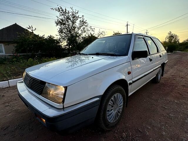 Белый Мицубиси Лансер, объемом двигателя 1.5 л и пробегом 55 тыс. км за 1500 $, фото 8 на Automoto.ua