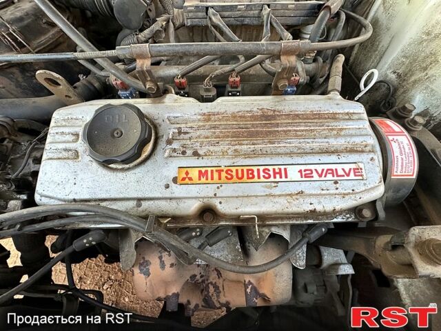 Белый Мицубиси Лансер, объемом двигателя 1.5 л и пробегом 55 тыс. км за 1500 $, фото 6 на Automoto.ua