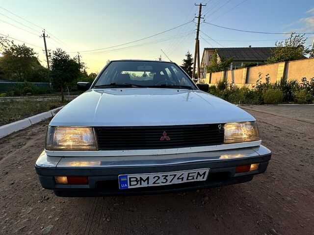 Белый Мицубиси Лансер, объемом двигателя 1.5 л и пробегом 55 тыс. км за 1500 $, фото 7 на Automoto.ua