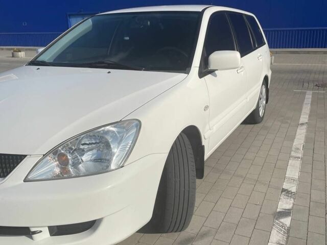 Білий Міцубісі Lancer, об'ємом двигуна 1.6 л та пробігом 279 тис. км за 3900 $, фото 1 на Automoto.ua
