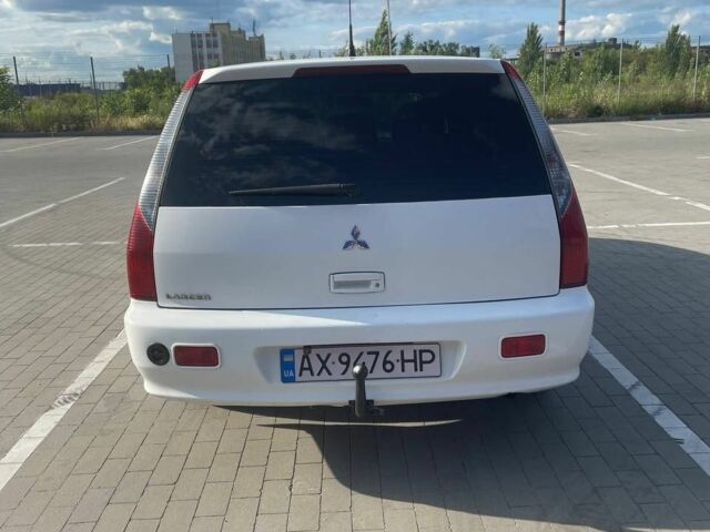 Білий Міцубісі Lancer, об'ємом двигуна 1.6 л та пробігом 279 тис. км за 3900 $, фото 3 на Automoto.ua