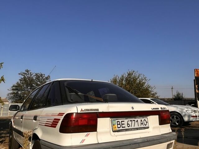 Білий Міцубісі Lancer, об'ємом двигуна 1.8 л та пробігом 350 тис. км за 2100 $, фото 4 на Automoto.ua